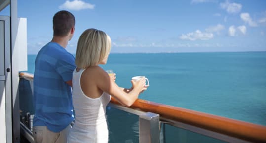 couple on cruise ship balcony